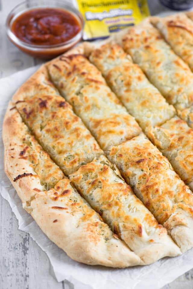 serving dish with breadsticks