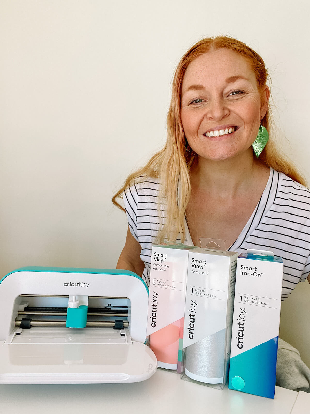 woman with cricut joy and smart materials