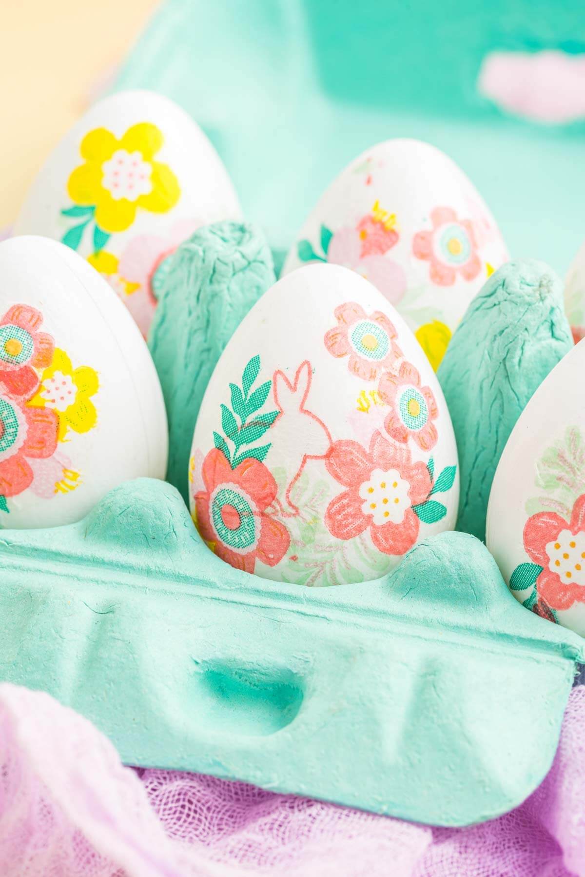 eggs decorated with floral easter napkins 