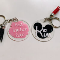 cute pesonalised keychains made using cricut joy and vinyl.