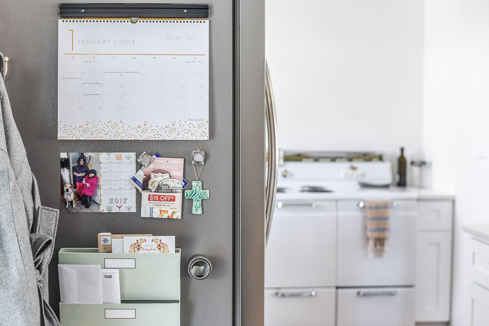 family command centre on side of fridge in kitchen