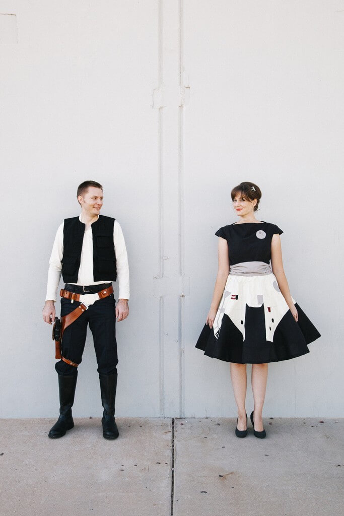 man dressed as han solo and woman in a millennium falcon dress