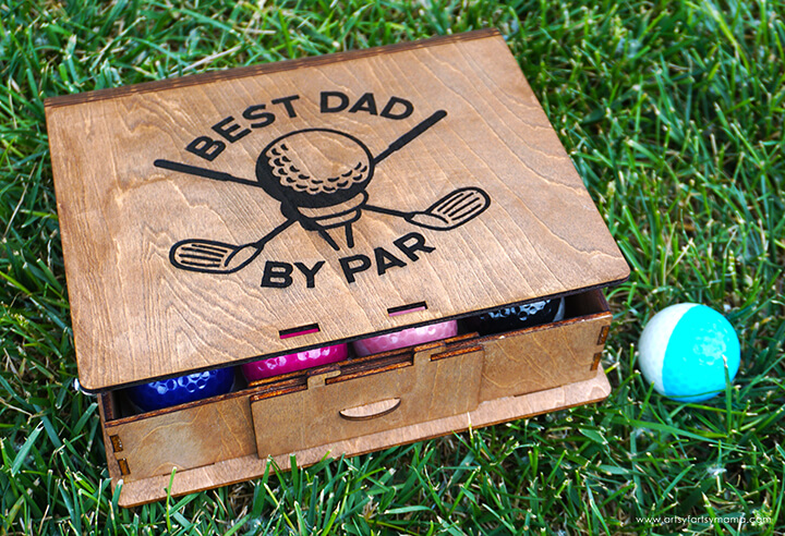 wooden golf ball box with best dad by par engraved on top