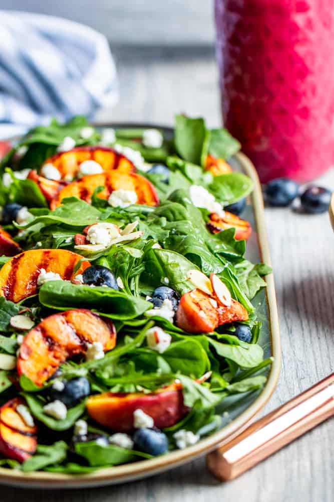 grilled beach salad in serving dish on table