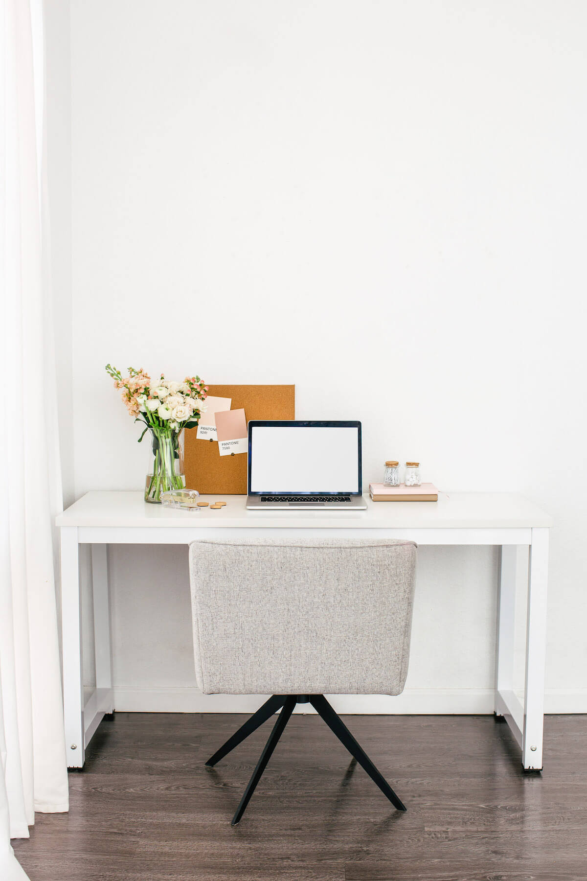 minimalist office with laptop on desk