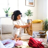 woman decluttering clothing