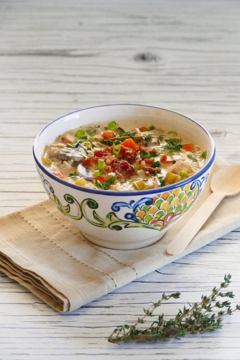 instant pot cream of chicken soup in a bowl on a tea towel