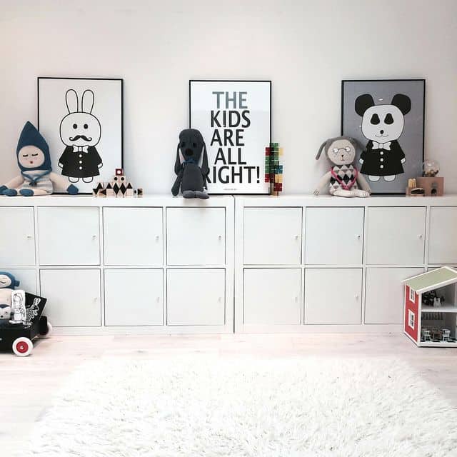 Simple white doors on kallax shelves in kids bedroom