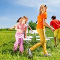 kids playing musical chairs outdoors