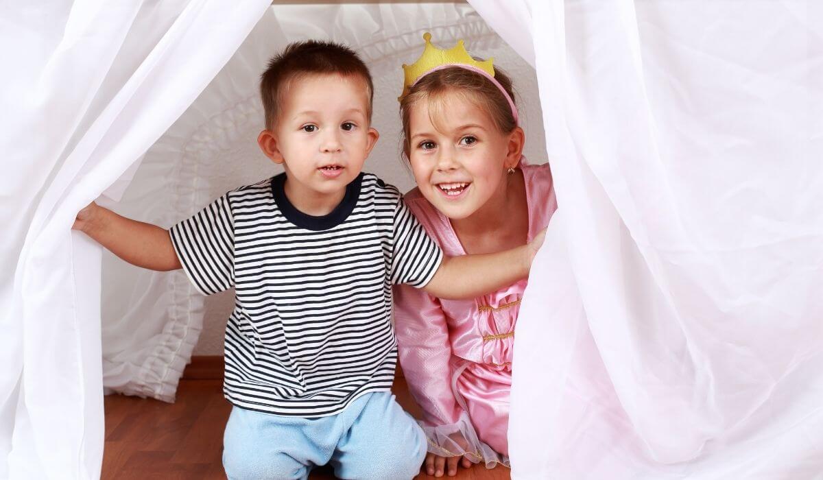 two kids hiding during a game