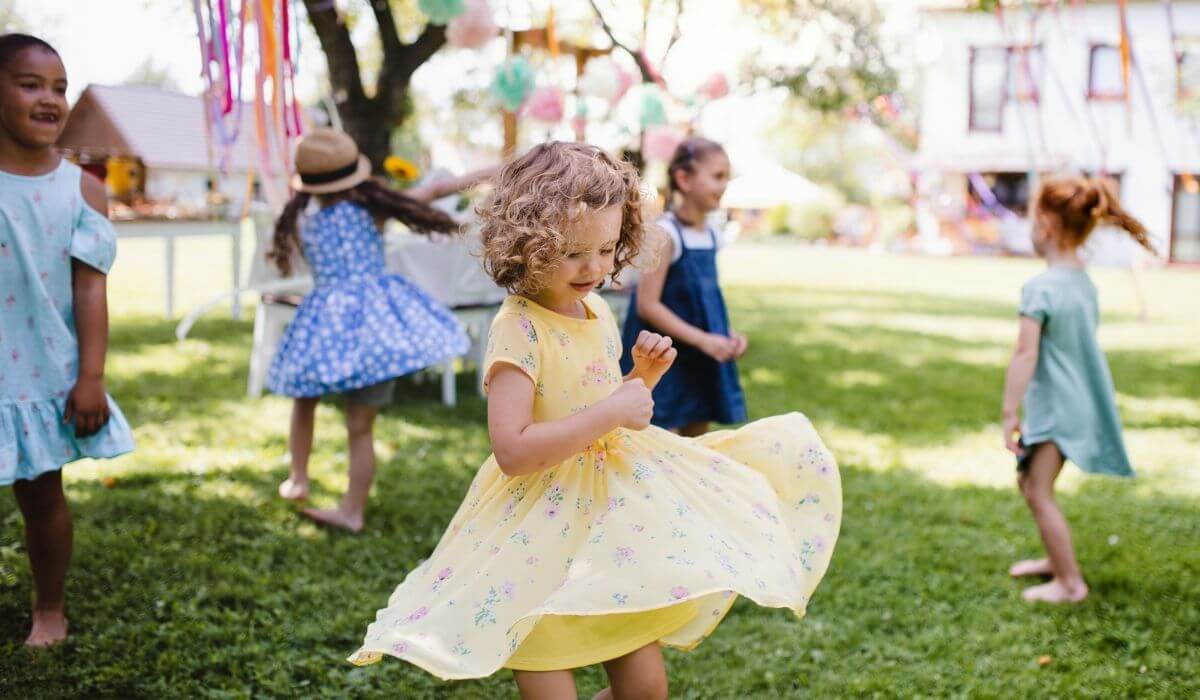 young kids dancing during a party game