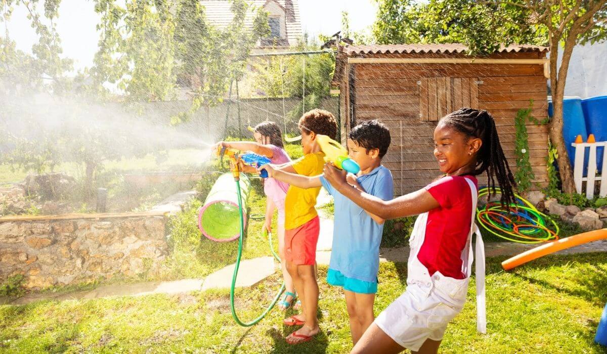 kids having a water pistol fight