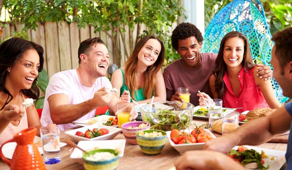 lunch party with a group of friends dining outdoors