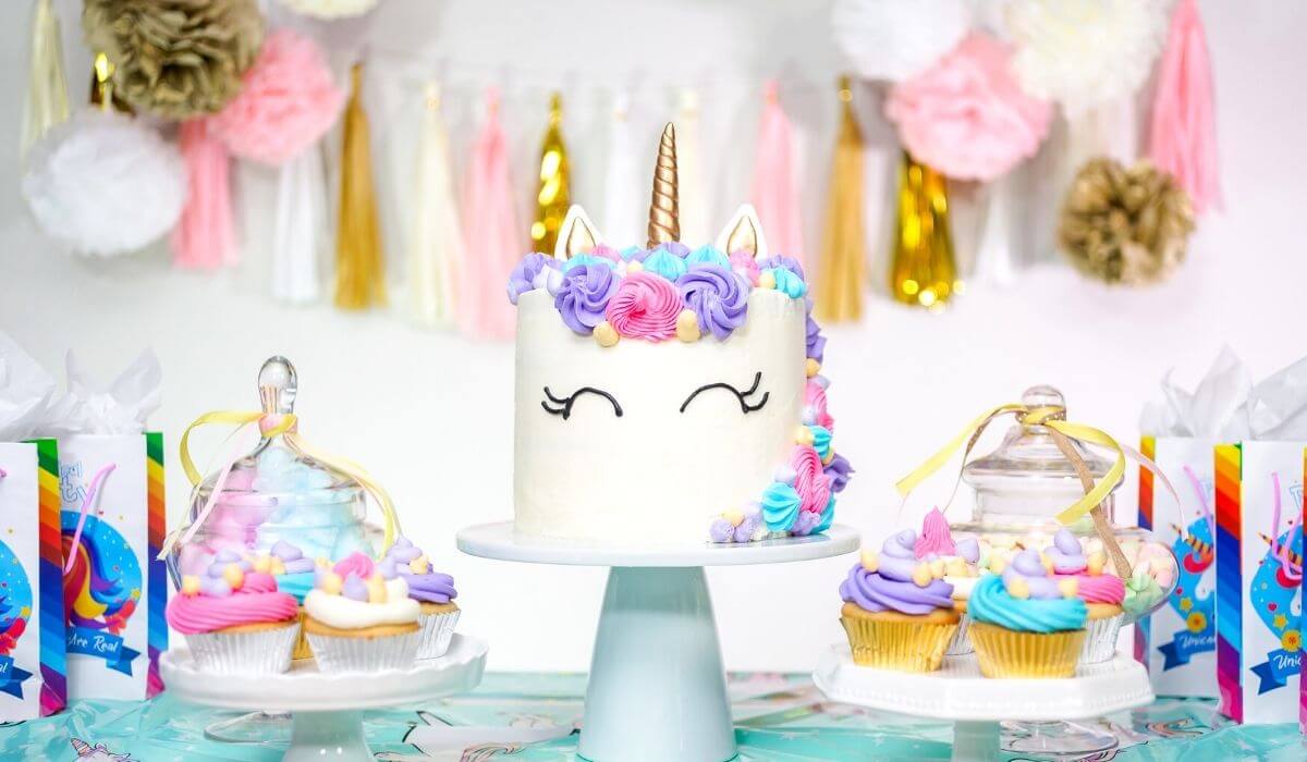 kids unicorn party theme with unicorn cake and decorations