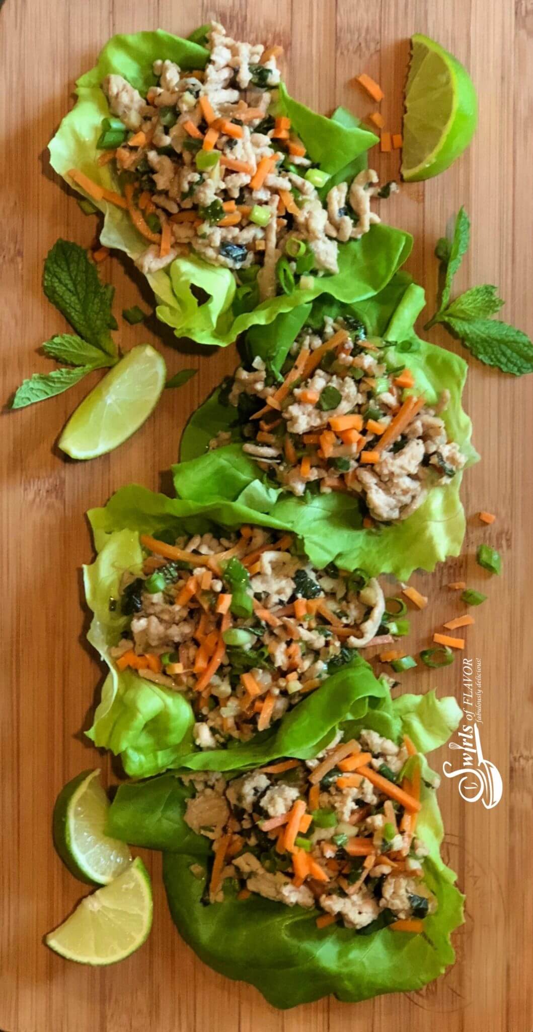 thai chicken lettuce wraps on table