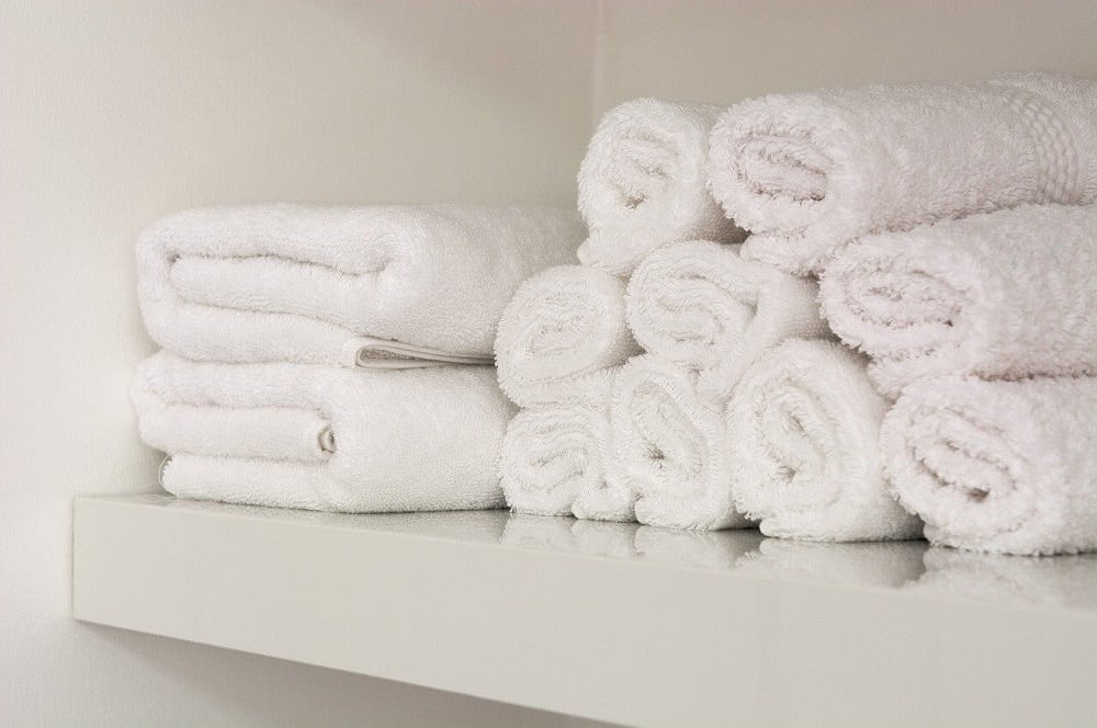 Rolled towels linen cupboard organisation ideas