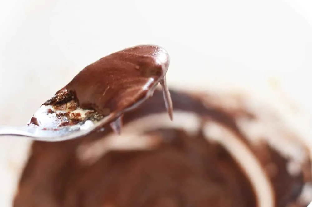 chocolate icing on a spoon