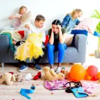 woman overwhelmed by messy house