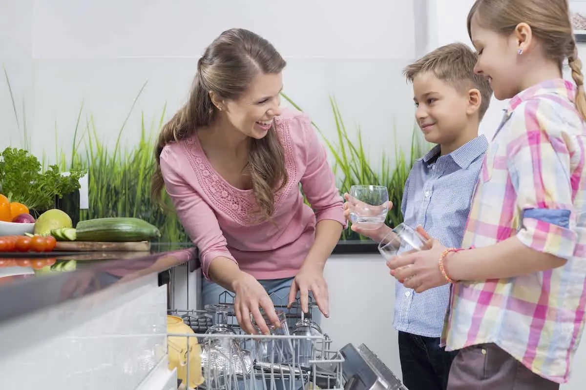 family emptying dishwasher