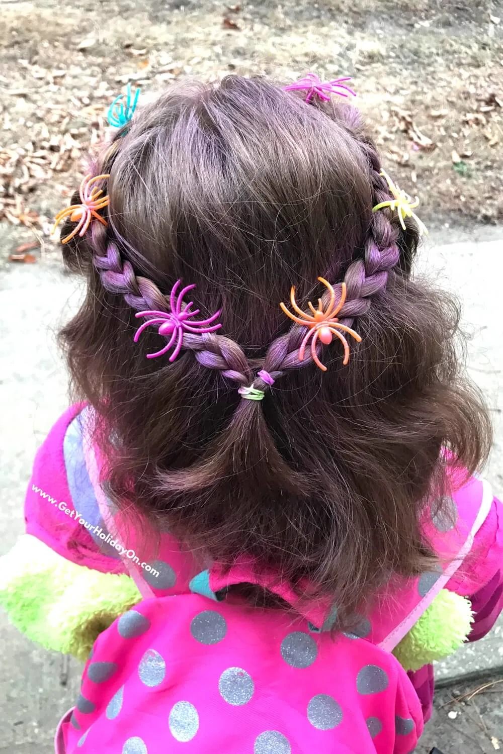 halloween hair style with coloured hair chalk and spiders in braids.