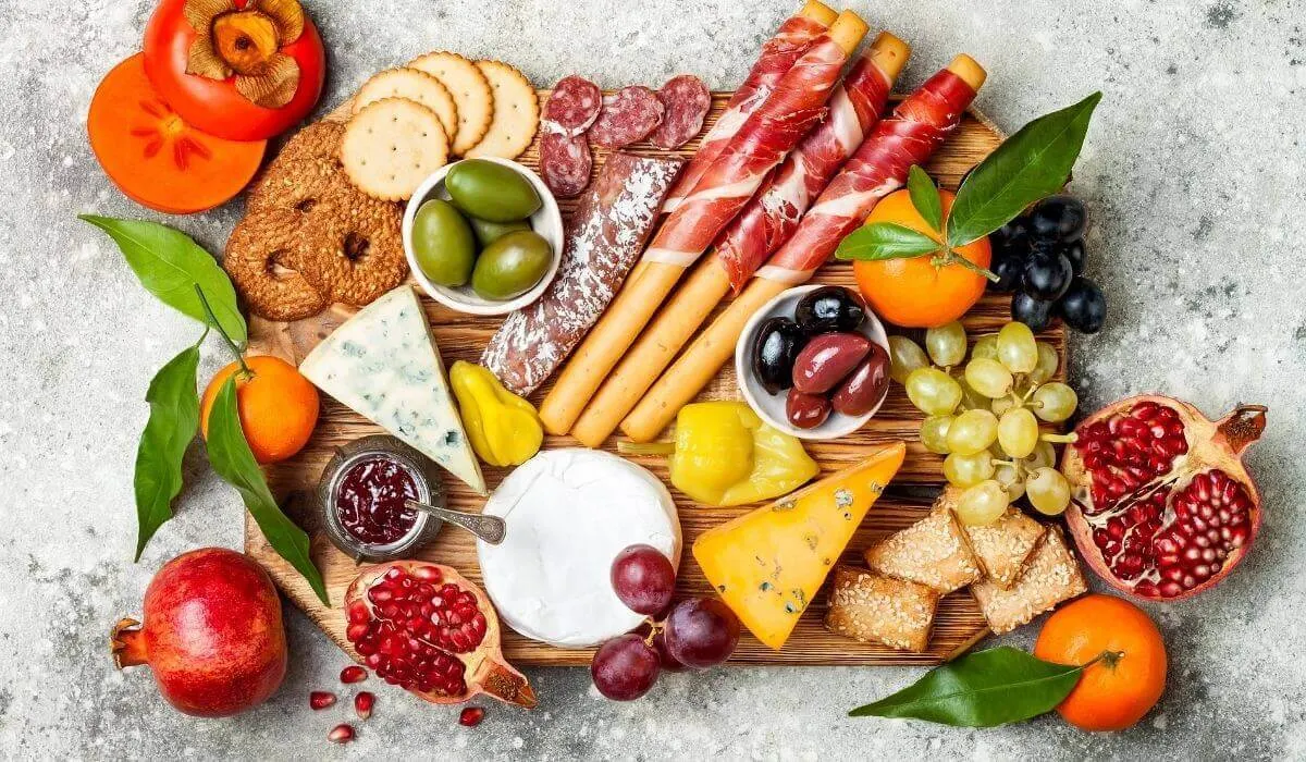 simple charcuterie board with cheese and fruit