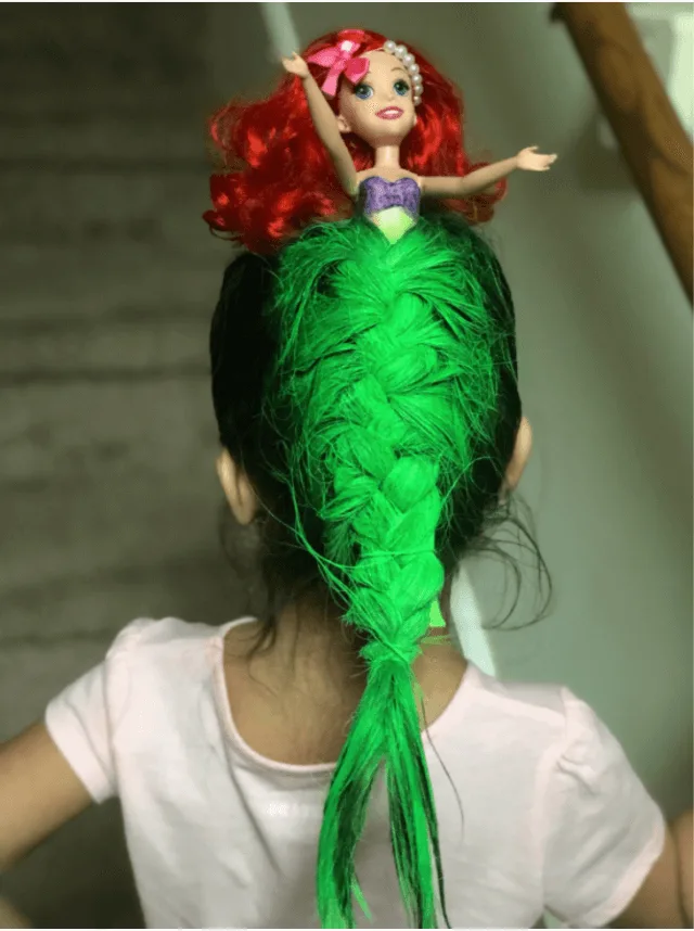 the little mermaid hairstyle with an ariel barbie doll and green hairspray. 