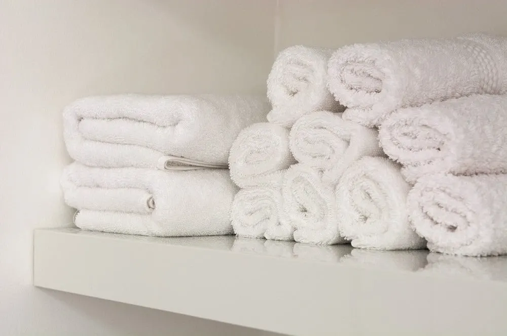 Rolled towels linen cupboard organisation ideas