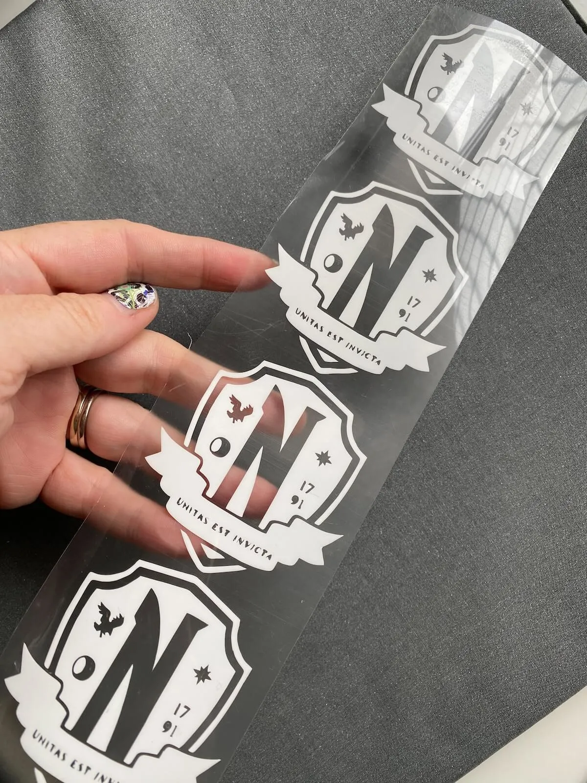 nevermore academy logo cut from white heat transfer vinyl.