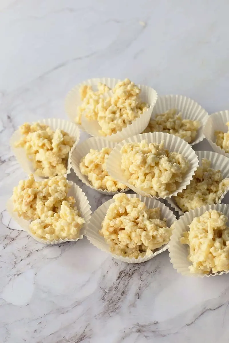 white chocolate crackles stacked on a table